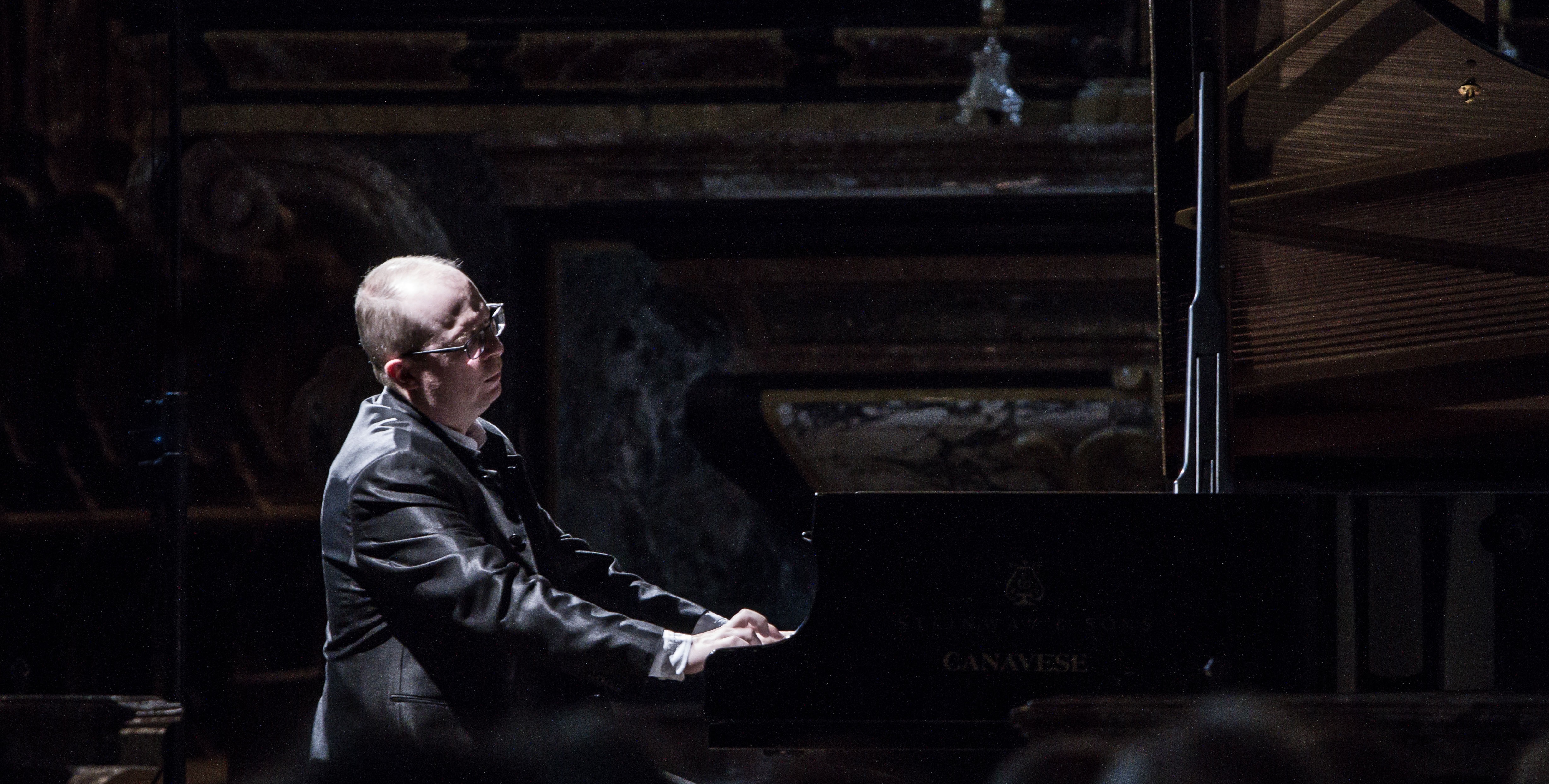 Dr. Alexander Tutunov performing piano